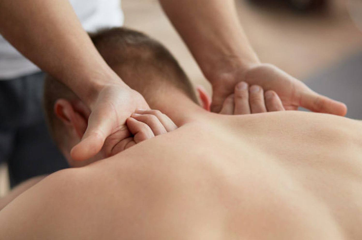 Therapist working a guest's back during a Relaxation massage at Cozy Massage Spa North Hollywood
